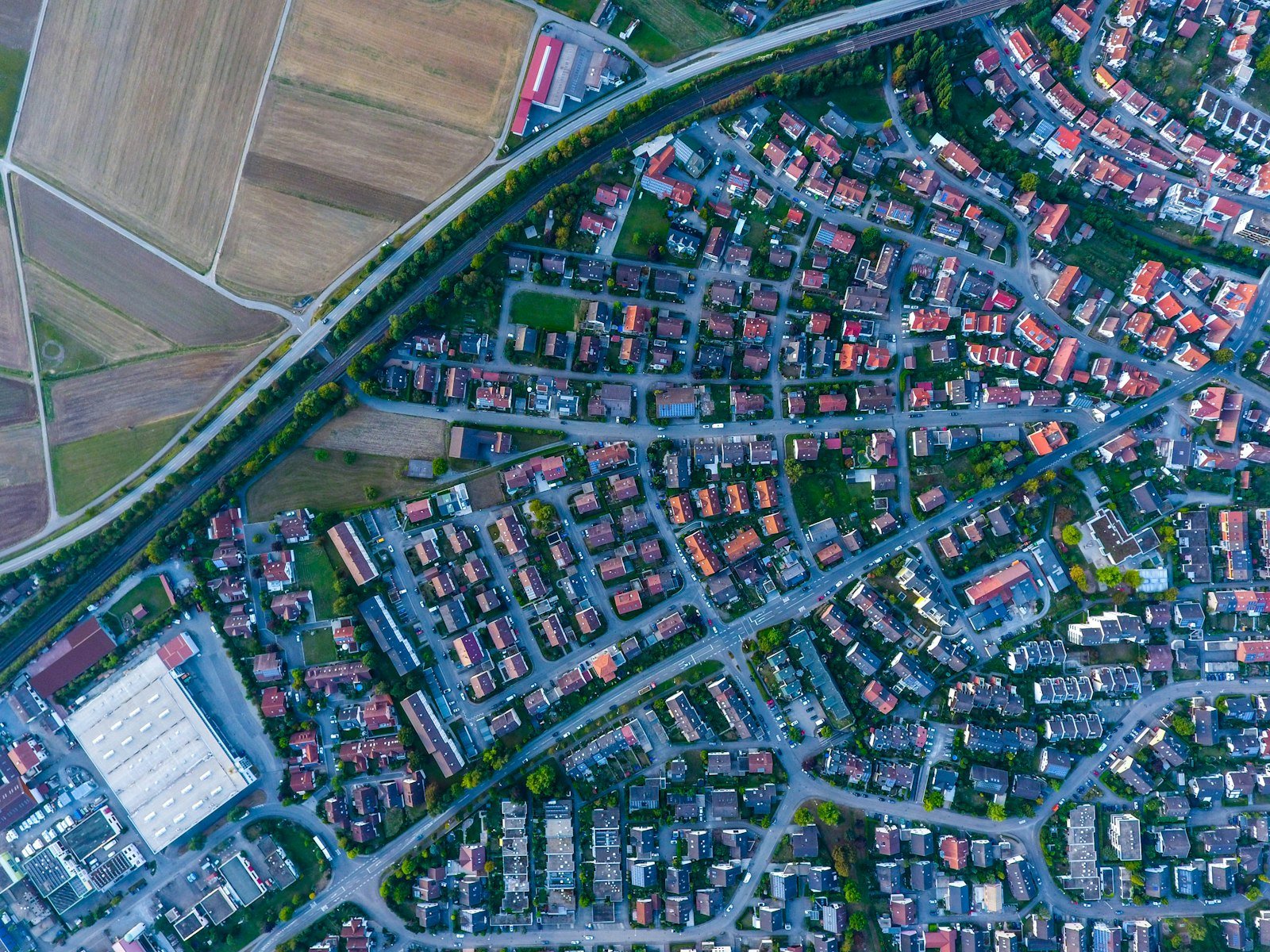 Aerial view of a neighbourhood with buildings and roads, illustrating geographic service coverage